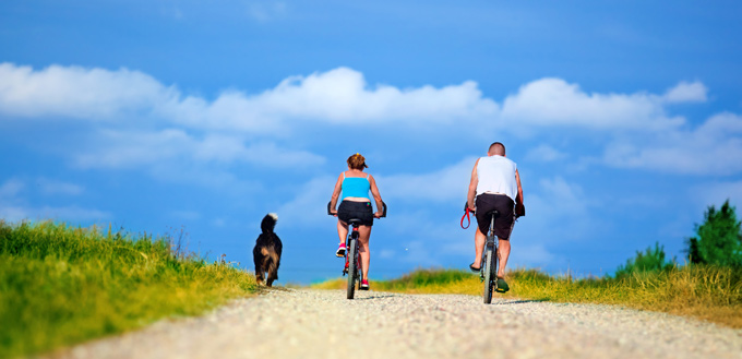 bike riding with a dog