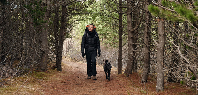Hiking woman with dog