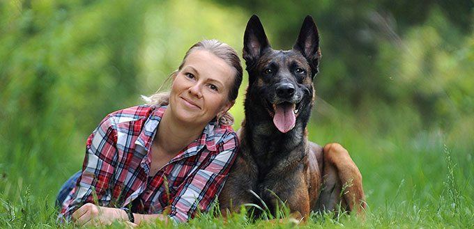 Girl and Belgian dog