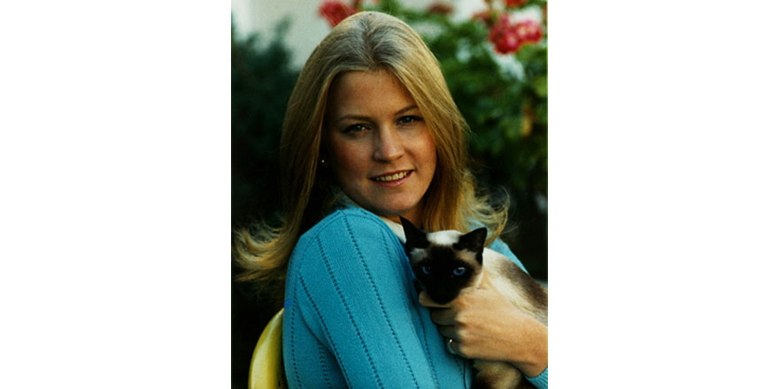 Susan Ford with Shan, the Ford family's Siamese Cat. October 4, 1974.