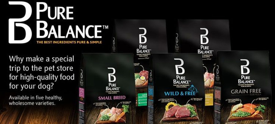 Pure Balance Dry Food bags on a Wooden table with a black background.