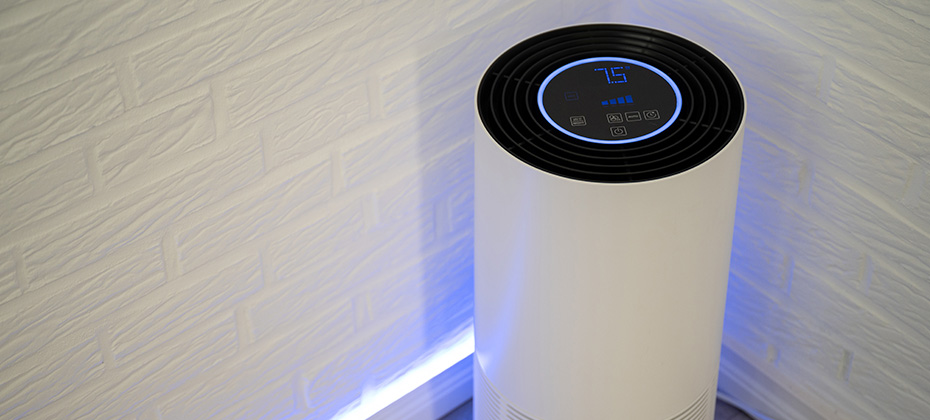 White UV-C air purifier filters viruses and pollutants from indoor air