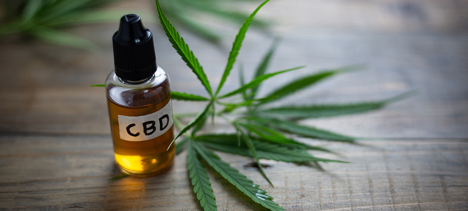 Medicinal cannabis with extract oil in a bottle