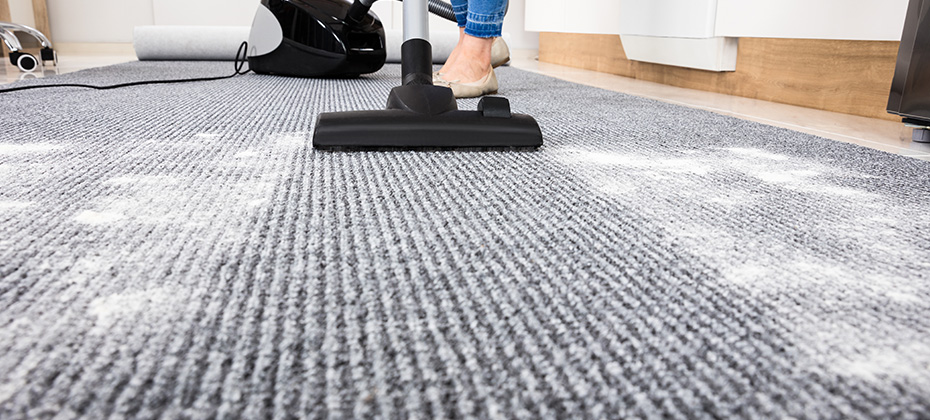 Vacuum Cleaner Cleaning Dirt On Carpet